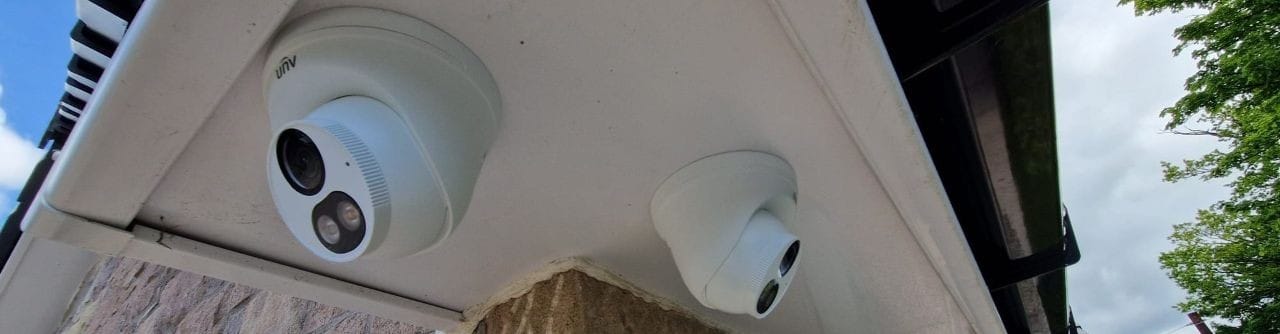 CCTV security cameras mounted on a building wall, providing surveillance